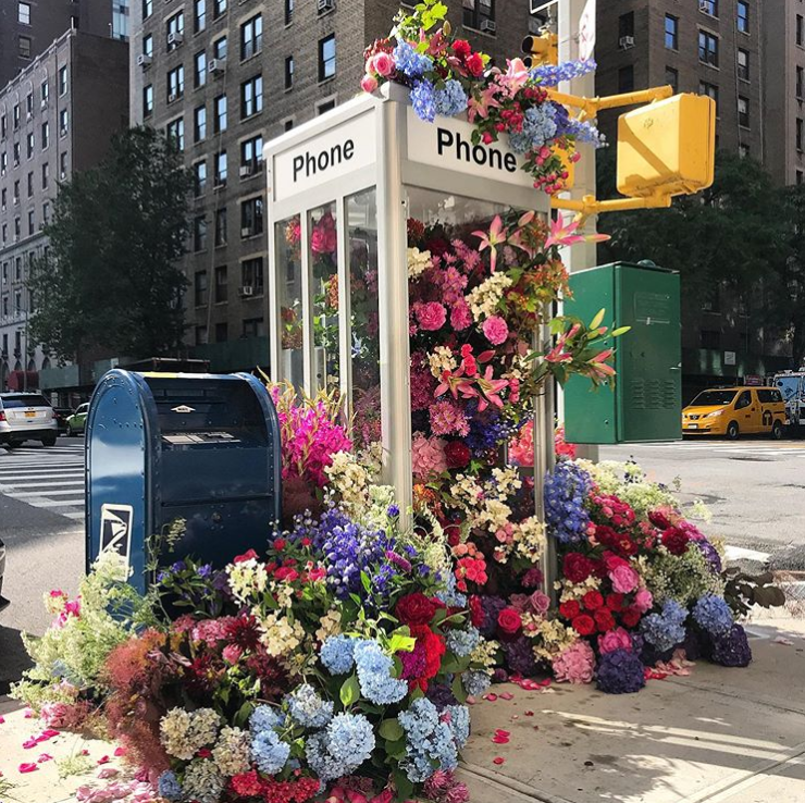 Florist Decorates Statues and Trash Cans With Beautiful Flower Displays