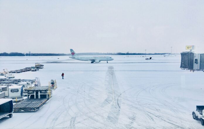 Air Canada plane in a snowy airfield